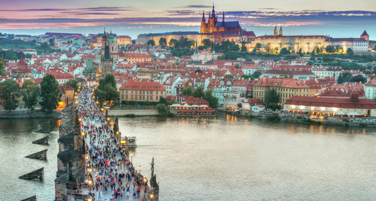 Adorned with beautiful statues and offering breathtaking views of the Vltava River, The Charles Bridge is an iconic landmark and a must-visit for travelers exploring the rich history and charm of Prague.